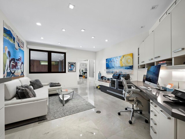 office with marble finish floor and recessed lighting