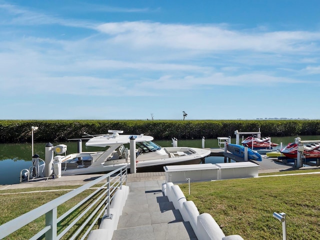 exterior space featuring a water view and a boat dock