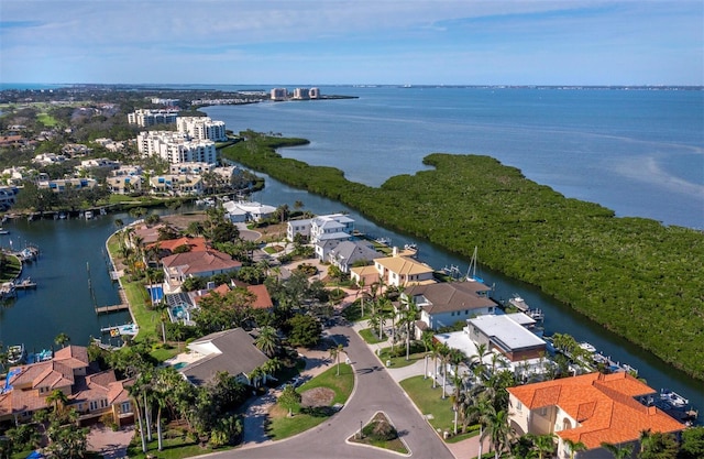 bird's eye view with a water view and a residential view