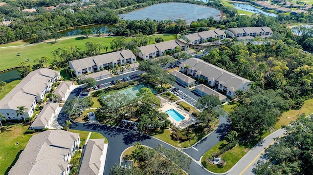 aerial view with a water view and a residential view