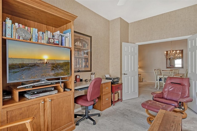 office space featuring wallpapered walls, a chandelier, and light colored carpet