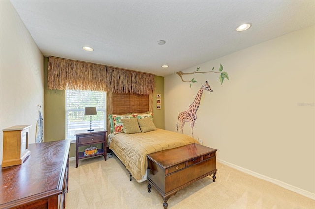 bedroom with baseboards, recessed lighting, and light colored carpet