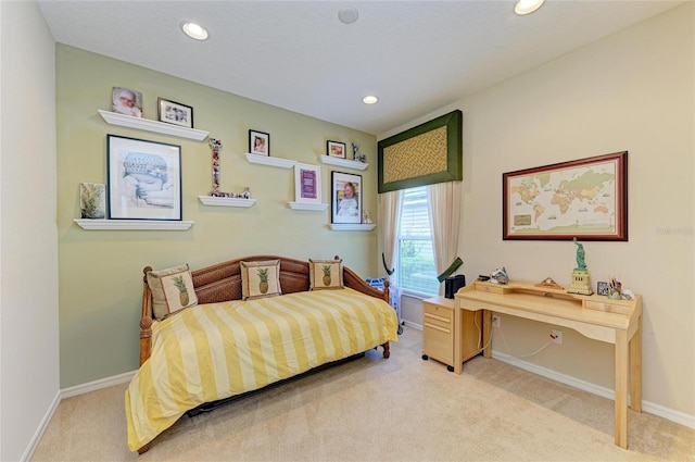 carpeted bedroom featuring baseboards and recessed lighting