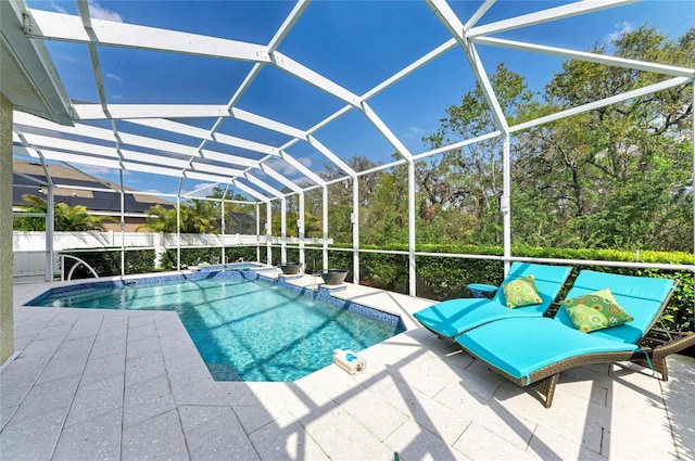 view of pool with a fenced in pool, a lanai, and a patio