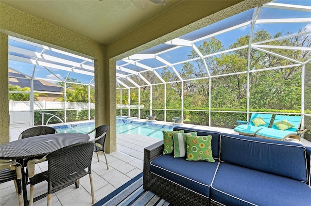 view of patio / terrace featuring glass enclosure, outdoor lounge area, and a pool with connected hot tub