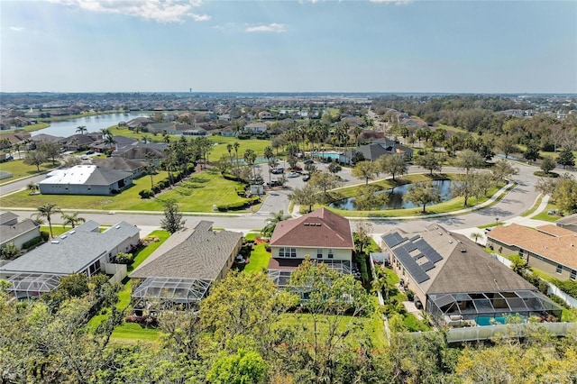 aerial view featuring a water view and a residential view