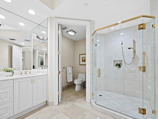 full bath with visible vents, a shower stall, toilet, and vanity