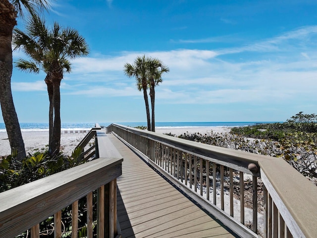 view of community featuring a water view and a view of the beach