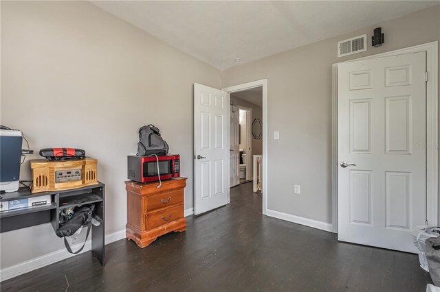 interior space with visible vents and baseboards