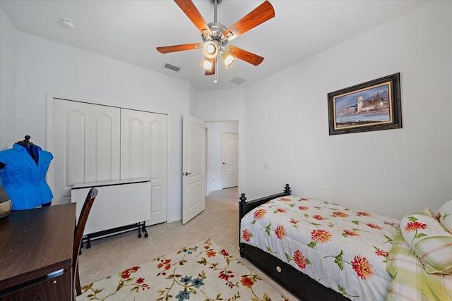 bedroom featuring a ceiling fan, a closet, and visible vents