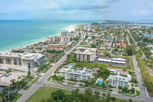 bird's eye view featuring a water view and a view of city