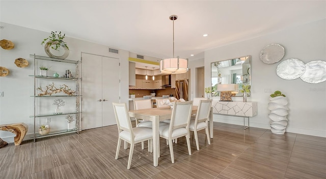 dining area featuring recessed lighting, visible vents, and baseboards