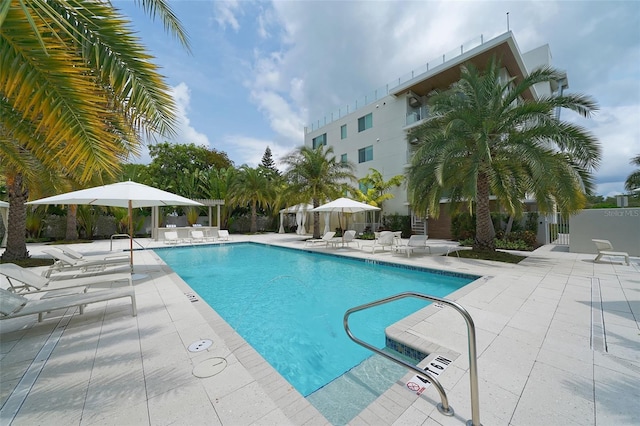 community pool featuring a patio area