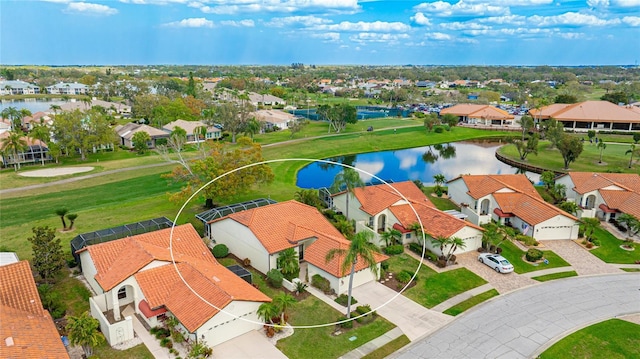 aerial view with a water view and a residential view