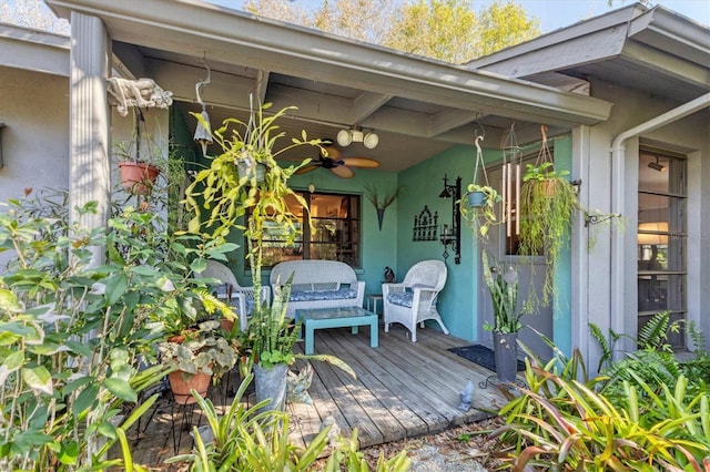 wooden deck with ceiling fan