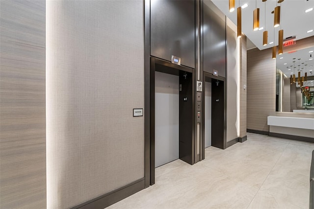 corridor featuring elevator