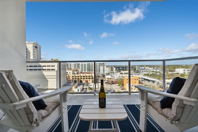 balcony featuring a city view