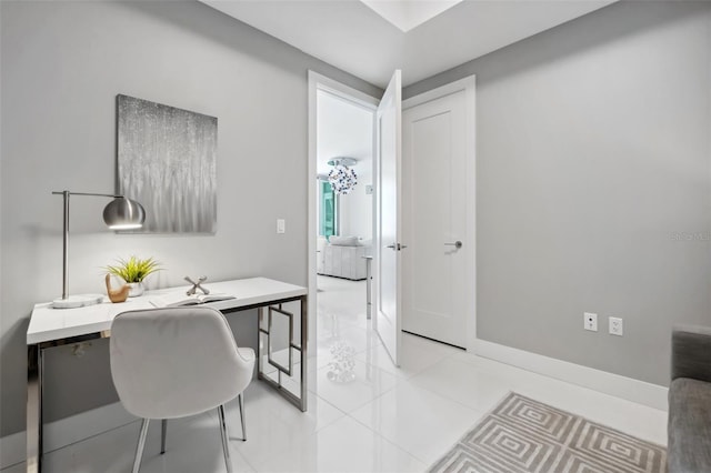 home office with light tile patterned flooring