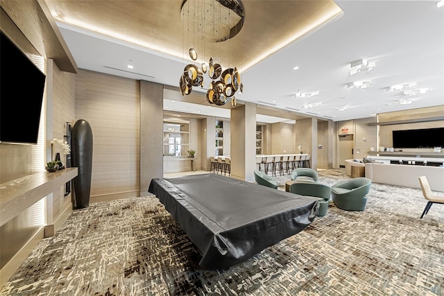 rec room with billiards, a tray ceiling, a chandelier, and recessed lighting