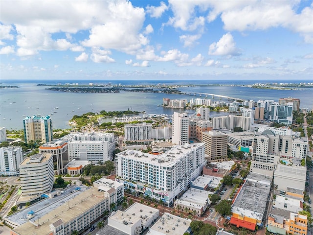 aerial view featuring a view of city and a water view