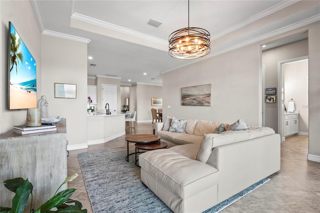 living area with light tile patterned floors, baseboards, visible vents, crown molding, and a notable chandelier