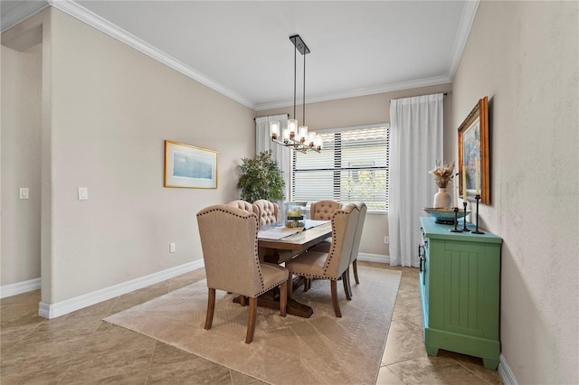 dining space featuring crown molding, a notable chandelier, and baseboards