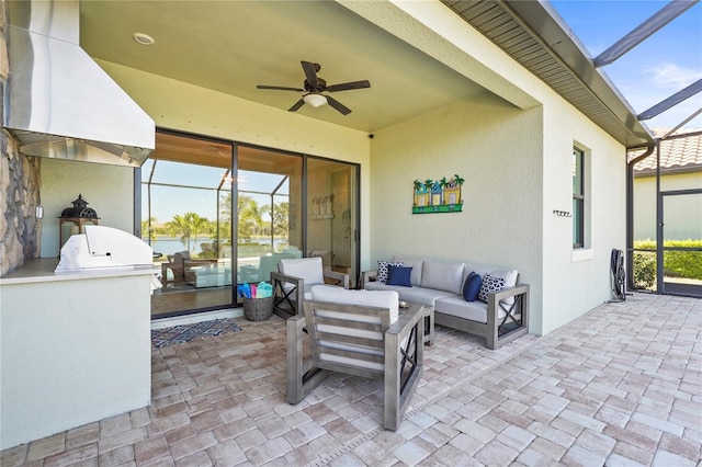 view of patio / terrace with ceiling fan, an outdoor living space, area for grilling, and a lanai