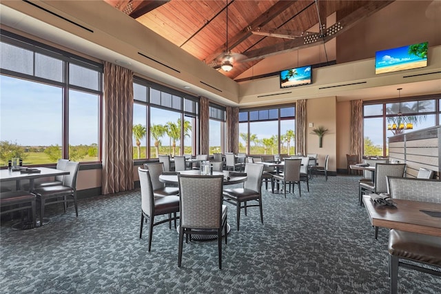 dining area with beamed ceiling, high vaulted ceiling, wooden ceiling, carpet flooring, and baseboards