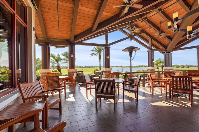 view of patio / terrace with an outdoor hangout area, outdoor dining space, and a ceiling fan