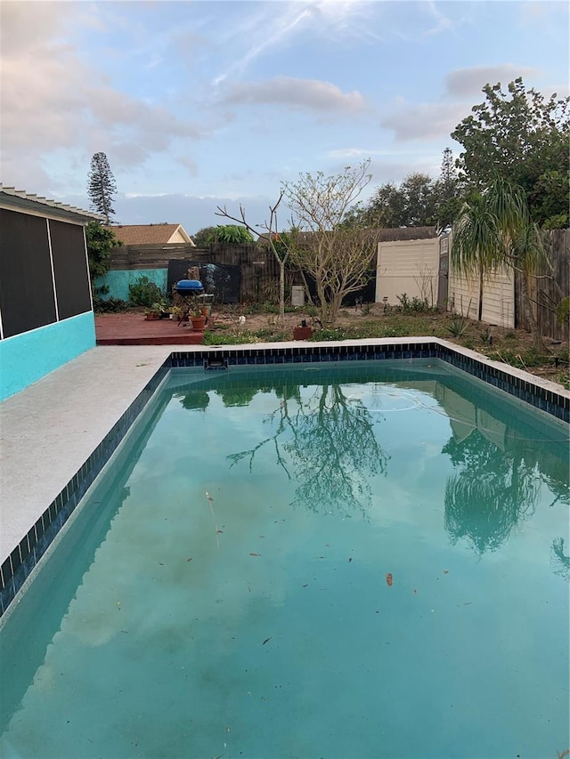 view of pool with a fenced backyard and a fenced in pool