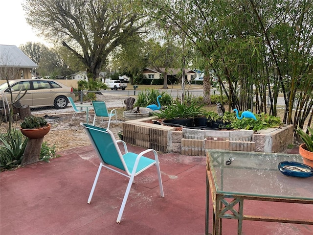 view of patio featuring fence