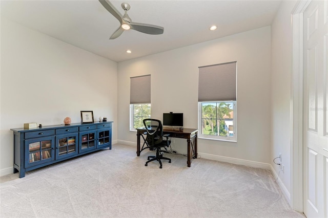 carpeted office space featuring ceiling fan, baseboards, and recessed lighting