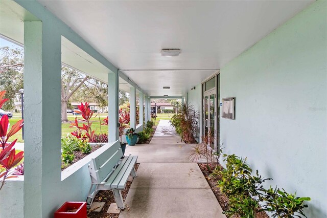 view of patio featuring a porch