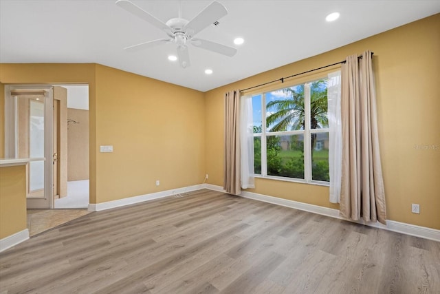 unfurnished room featuring ceiling fan, recessed lighting, light wood-style flooring, and baseboards