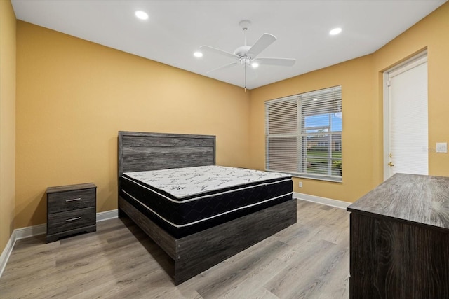 bedroom featuring light wood-style flooring, baseboards, a ceiling fan, and recessed lighting