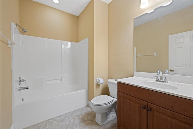 bathroom with toilet, tile patterned floors, washtub / shower combination, and vanity