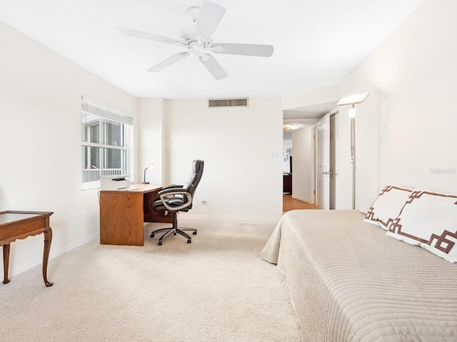 bedroom with light colored carpet, visible vents, ceiling fan, and baseboards