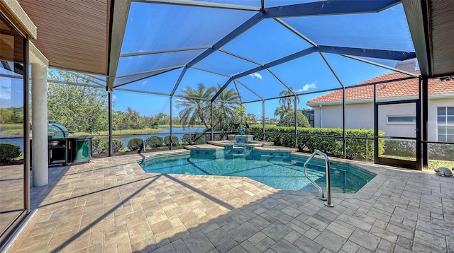 6621 The Masters Ave, Lakewood Ranch, FL 34202 - view of pool with a patio, a water view, a pool with connected hot tub, and a lanai