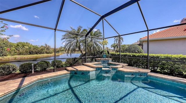 6621 The Masters Ave, Lakewood Ranch, FL 34202 - view of swimming pool with a water view, a lanai, and a pool with connected hot tub