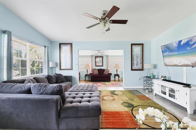 2564 Wood St, Sarasota, FL 34237 - living area featuring a ceiling fan and baseboards