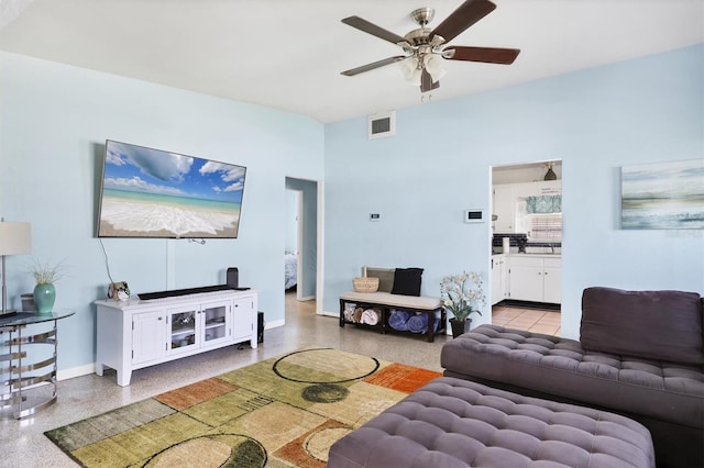 2564 Wood St, Sarasota, FL 34237 - living room featuring ceiling fan, speckled floor, visible vents, and baseboards