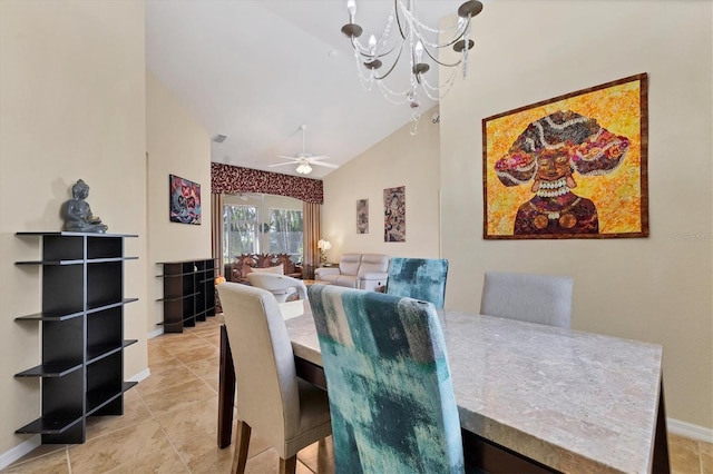 dining space with high vaulted ceiling, light tile patterned flooring, baseboards, and ceiling fan with notable chandelier