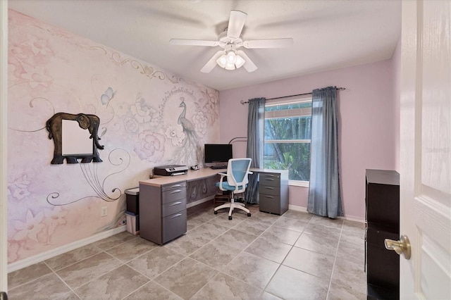 office area featuring ceiling fan, light tile patterned flooring, and baseboards