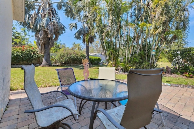 view of patio featuring outdoor dining area