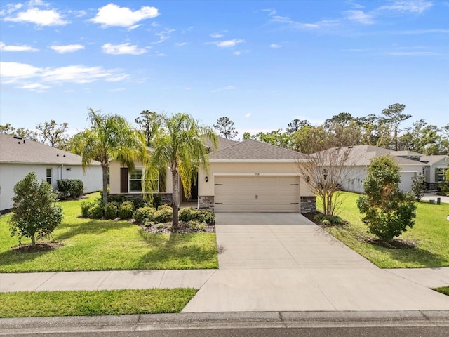 view of front of property with stucco siding, concrete driveway, a front yard, a garage, and stone siding