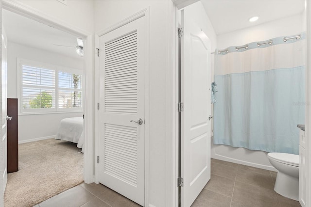 bathroom with toilet, shower / tub combo, recessed lighting, and tile patterned floors