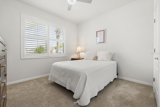 bedroom featuring a ceiling fan, baseboards, and carpet flooring