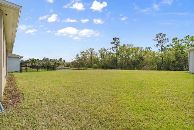 view of yard featuring fence