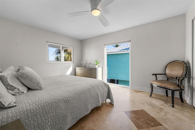 bedroom featuring baseboards and a ceiling fan