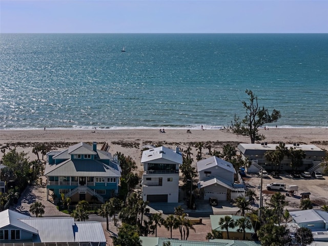 aerial view featuring a water view and a view of the beach